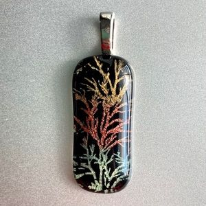 Unique glass pendant resembling tree branch